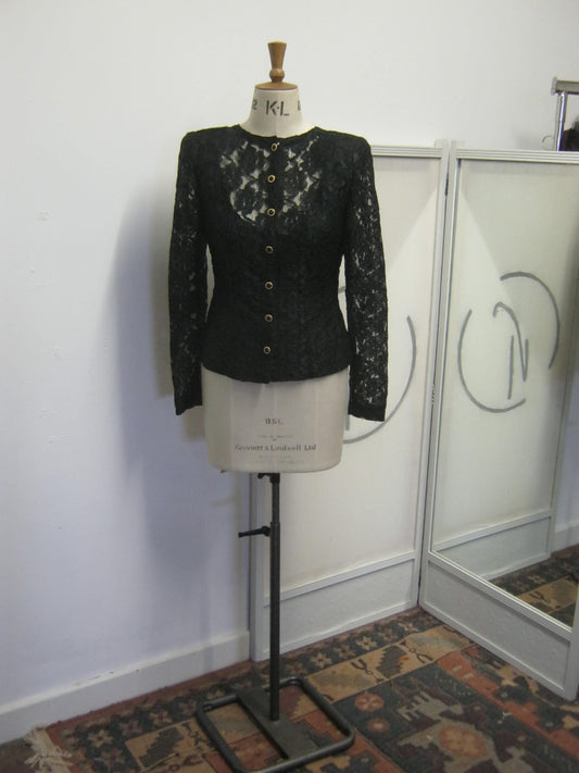 Long sleeved black blouse/jacket